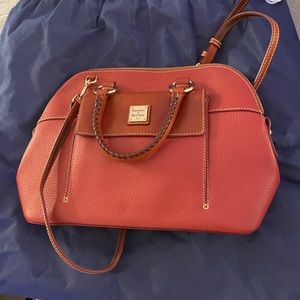 Dooney & Bourke leather shoulder bag with pouch.